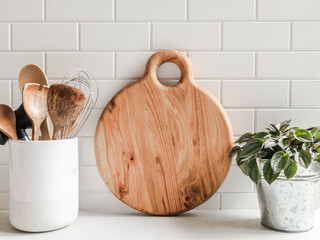 White kitchen background with kitchen utensils