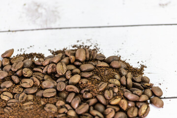 coffee beans on white wood background