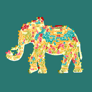 Vector decorated Indian Elephant silhouette and colored on green background. eps 10