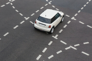 Car moves along the Crossroads. Top view.