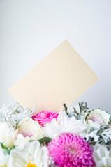 Greeting, post card, invitation card photo mock up with the bouquet.