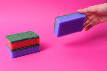 Red and purple sponge on pink background