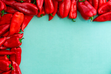 Red peppers on blue background