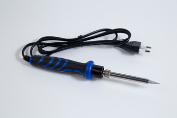 Soldering iron for electronic boards. A tool for repairing electronic components.