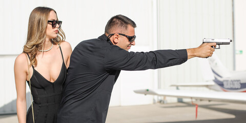 Celebbrity bodyguard and VIP protection services. Black suit and handsfree. Special forces. Police
