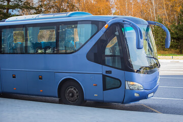 Tourist Bus At A Stop Opposite The Autumn Forest