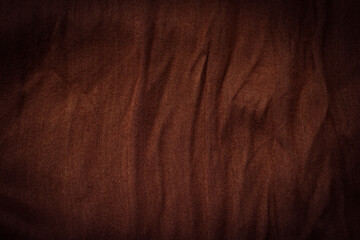 Surface of rough brown velvet fabric for background.