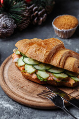 New Year's breakfast with croissants. New Year's croissant with shrimp. New Year and Christmas concept