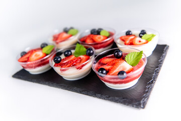 Panna Cotta  with strawberries, blueberries and pears 