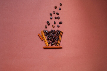 Coffee cup mockup made from cinnamon and coffee beans on beige background. Creative space for design. Trendy minimalist.
