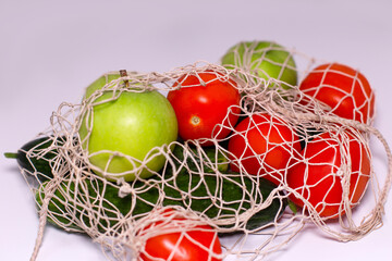 vegetables and fruits in a grid, on a gray background