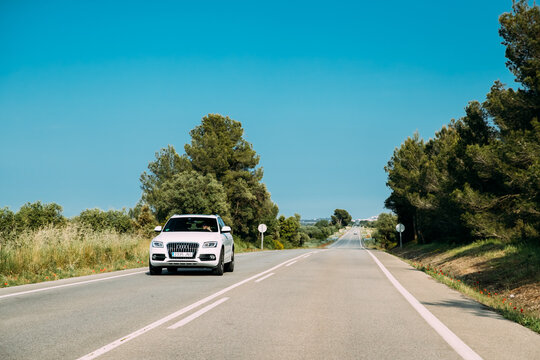 Audi Q5 (8R) Car Of White Color Drive In Spanish Country Road.