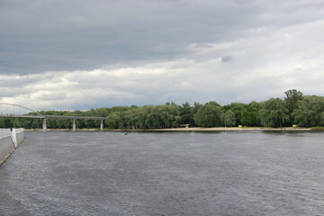 Fototapeta na wymiar Modern Sozh embankment in Gomel. Panorama with view to river