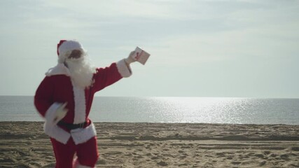 Santa Claus In Red Suit Came On Vacation On Tropical Sandy Beach Ocean