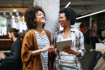 Business people having fun and chatting at workplace office