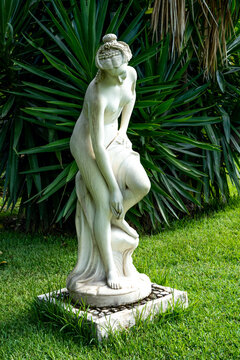 Beaulieu-sur-Mer, France. 14.07.2020 Garden sculpture depicts the figure of a beautiful young woman.