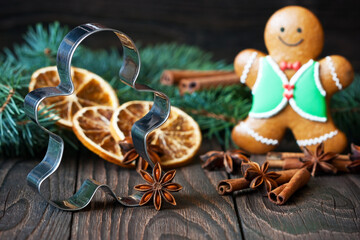 Gingerbread little man  with cookie cutter, Christmas concept