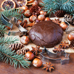 Making gingerbread cookies. Christmas baking background dough and cookie cutters