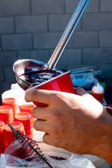 Pouring Punch into a Red Solo cup