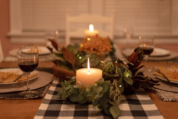 Cozy thanksgiving at home by candlelight
