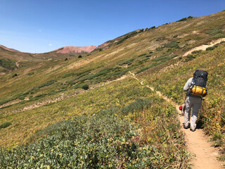 Backpacking with dog in Maroon Bells Wilderness Area, Colorado, USA