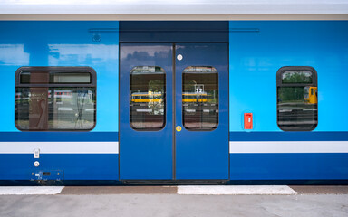 Direct View of a Closed Train Car Door Waiting on the Platform, Public Transportation