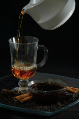 Festive hot tea, golden honey with star anise and cinnamon