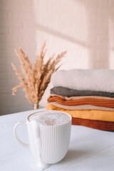 A Cup of coffee and a cozy home atmosphere.