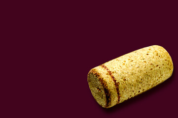 Wine cork stopper with a burgundy background