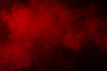 Red smoke texture on black background