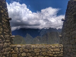 Ruins - Machu Picchu - The lost city of the Inca in Peru, South America. Set high in the Andes Mountains, is a UNESCO World Heritage Site and one of the New Seven Wonders of the World.