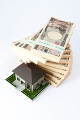 住宅と札束