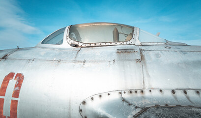 Old plane fuselage. Plane wreck at the aviation museum. Destroyed military plane.