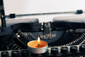 Typewriter close up and dry flowers