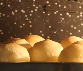 Cheese bread in the oven. Food Brazil.