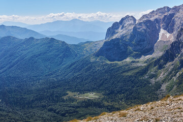Fototapeta premium view of the valley of Mount Fisht with the tourist shelter of the same name in the Caucasian nature reserve