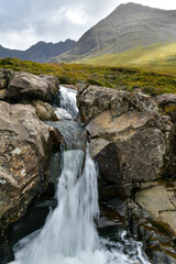 Fototapeta na wymiar beautiful landscapes, waterfalls, forests full of mushrooms and views of the Isle of Skye in Scotland