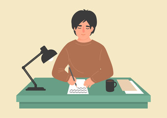 Man writes on the paper at desk. Writer, or student at table. 