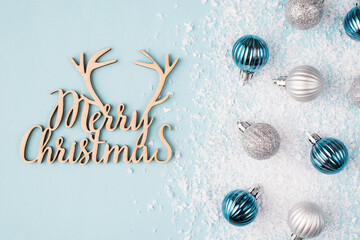 Christmas postcard with wishes concept. Top overhead close up view photo of small tree baubles in...