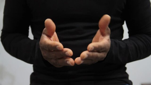 black man praying hand with black background stock video