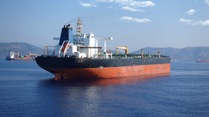 Fototapeta premium Detail photo of tanker ship anchored near port of Piraeus and island of Salamina, Saronic gulf, Attica, Greece
