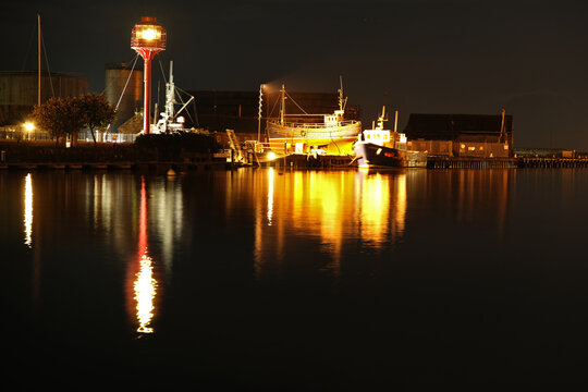 Albatross Light Tower in Arklow harbour with boats in behind