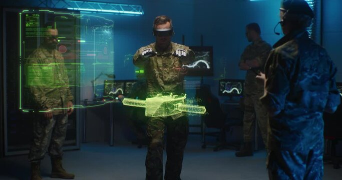 Military men controlling holographic model of drone