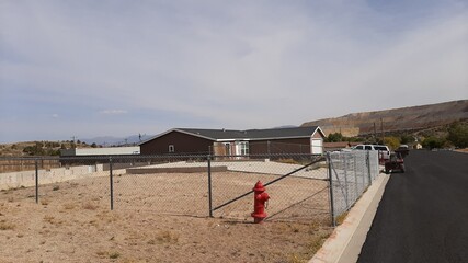 Home Construction Building Site with Foundation and  Driveway