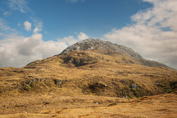 Diamond hill in Connemara National park, county Galway, Ireland, Bright sunny day, blue cloudy sky.