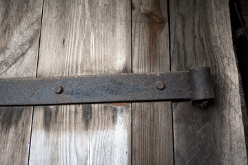 Village theme. Photo of barn door hinges
