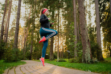 Confident woman training in the park