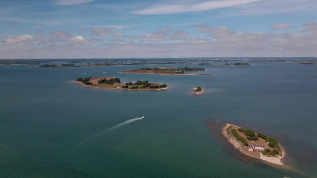 Aerial of islands and boats in gulf