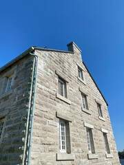 old brick house and blue sky