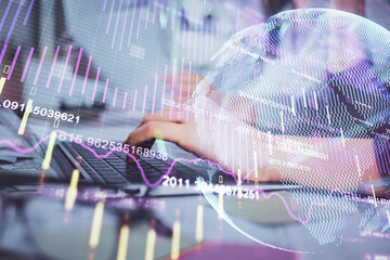 Multi exposure of woman hands typing on computer and financial graph hologram drawing. Stock market analysis concept.